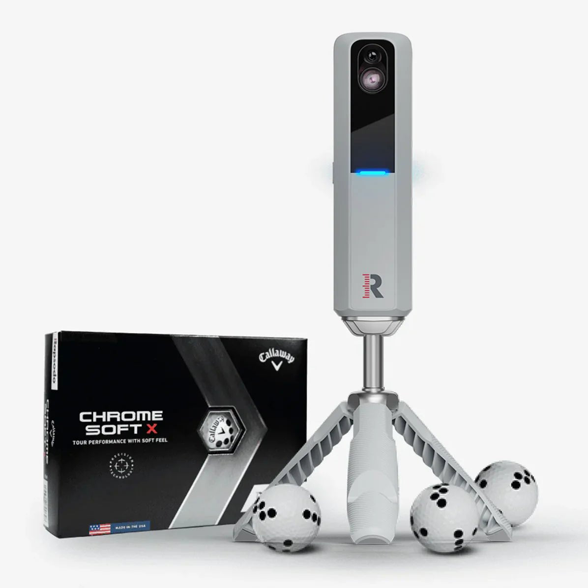Front view of the MLM2PRO with three golf balls and a box of chrome softx