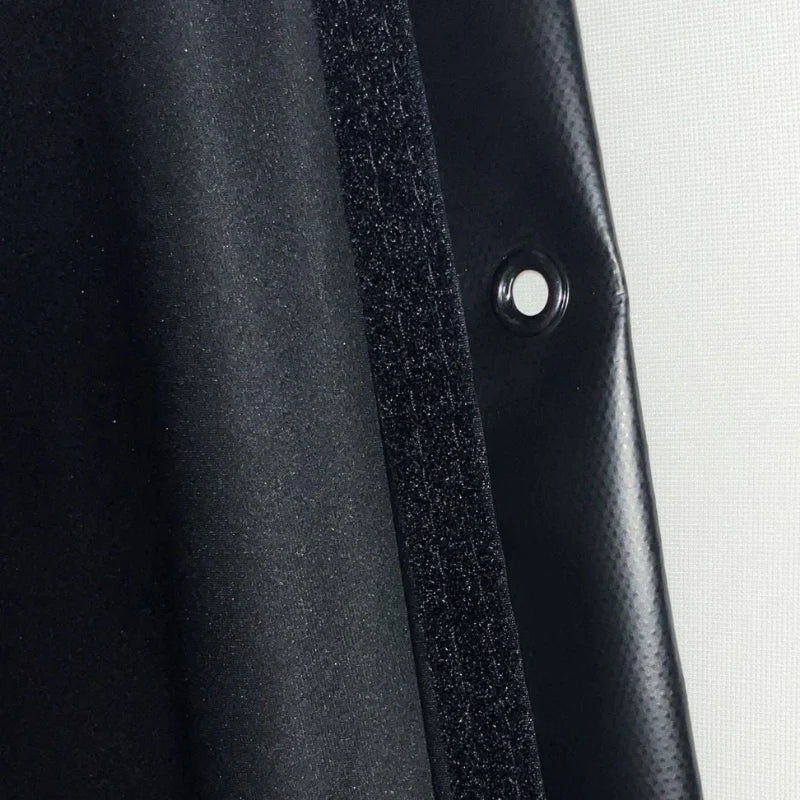 Close-up view of the grommet on the SIGPRO Golf Enclosure Blackout Screen.