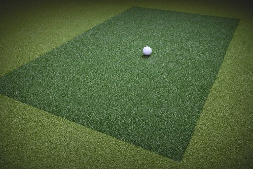 View of a golf on hitting mat